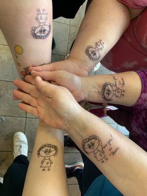 Matching family tattoo
